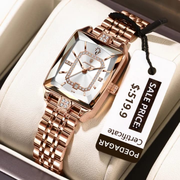 Rose gold watch with diamond accents on a white cushion, featuring a POEDAGAR tag with a sale price.