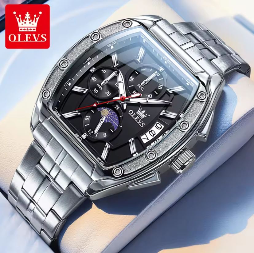 Silver OLEVS watch with black dial on a light background