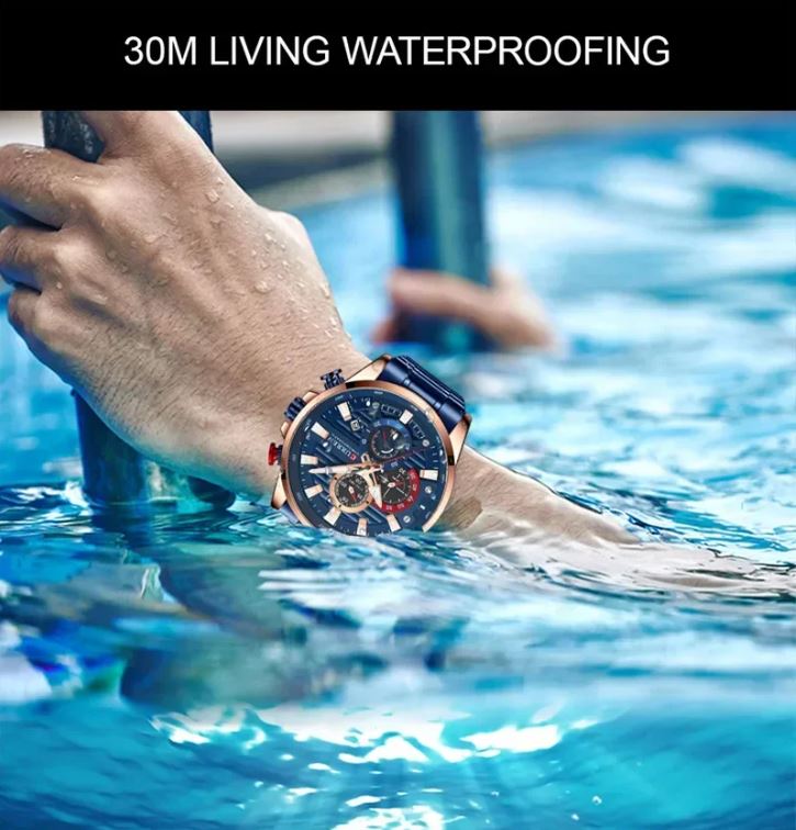 Hand wearing a watch with 30M living waterproofing feature, submerged in water.