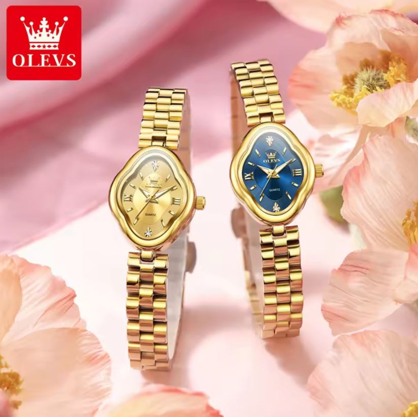 Two gold watches on a pink floral background with OLEVS branding.
