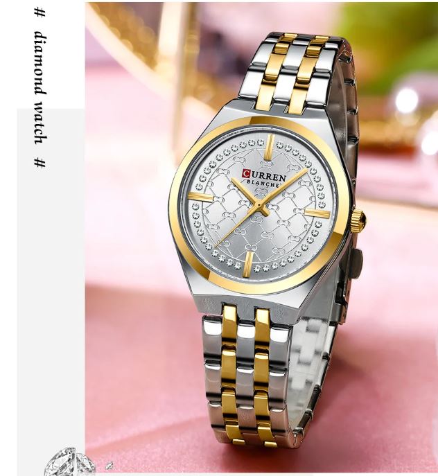 Two-tone watch with diamond-studded face on a pink background