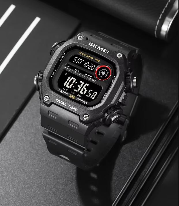 Black digital watch with a detailed display on a dark background