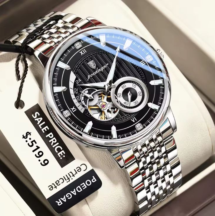 Silver watch with black face on a white surface, featuring a 'PODEAGAR' tag.