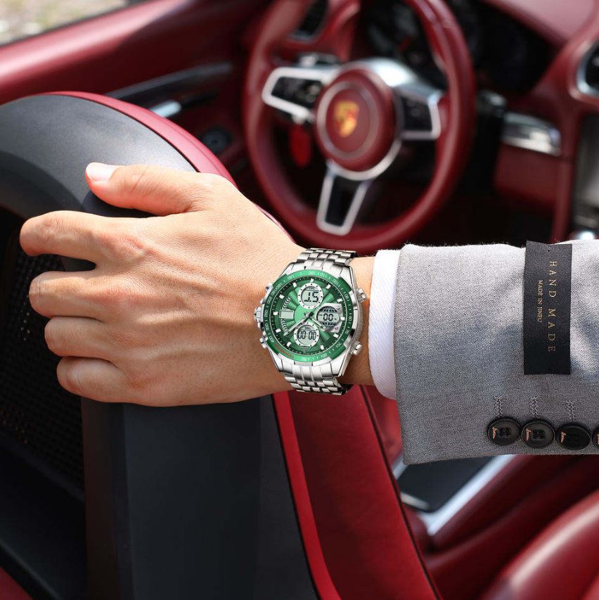 Hand wearing a green wristwatch with a car interior background