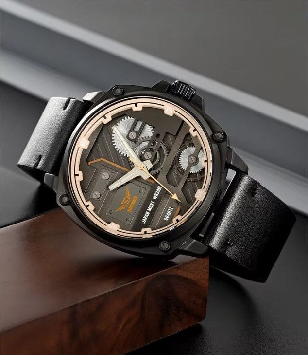 Luxury watch with black strap and detailed face on a dark background