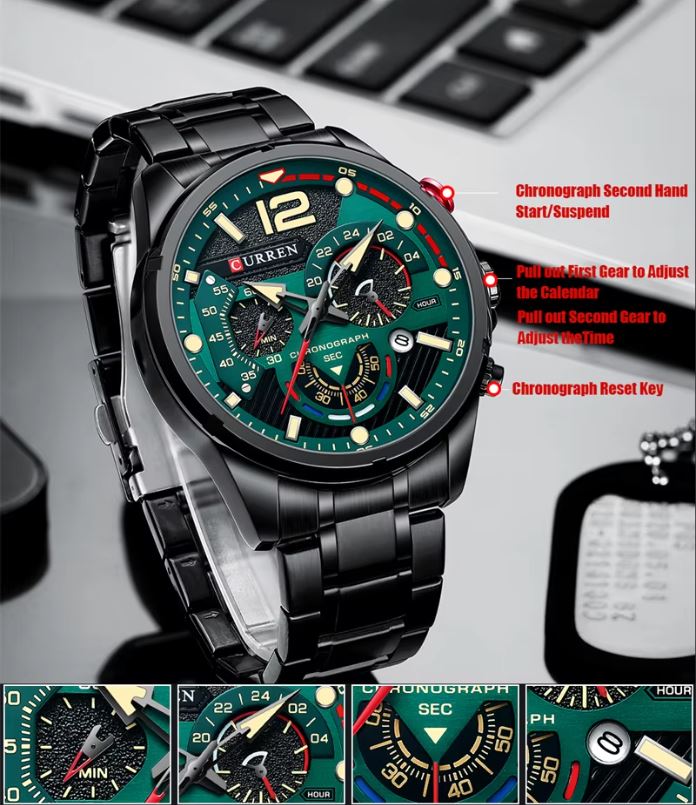 Black wristwatch with green dial on a gray surface, showing detailed features.