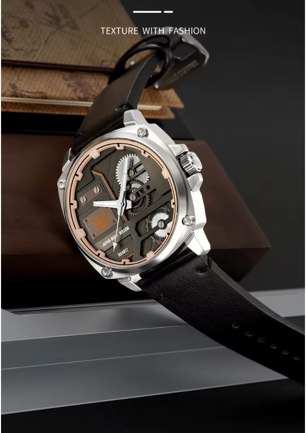 Luxury watch with black leather strap on a dark surface