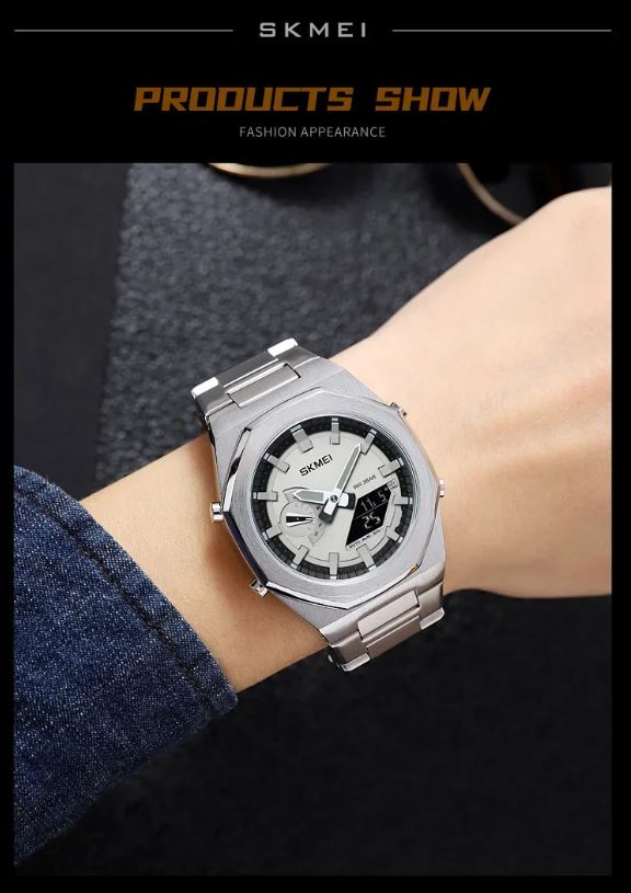 Silver Skmei watch on a wrist with a dark background