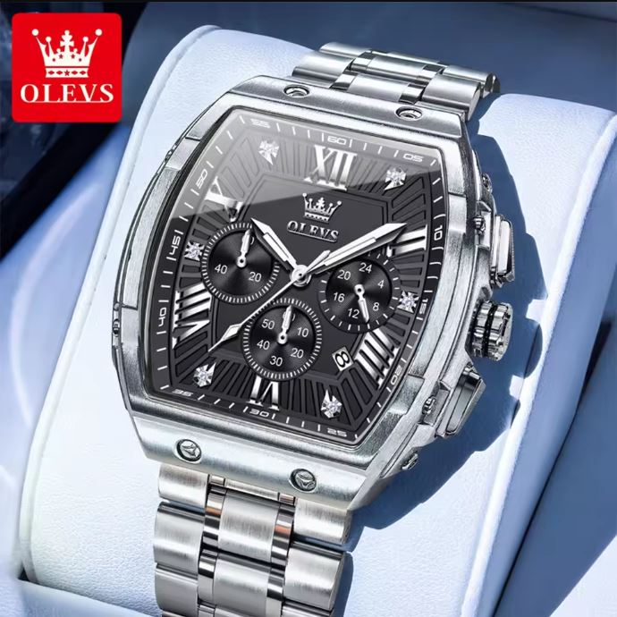 Silver wristwatch with black dial on a light blue background, featuring the OLEVS brand.