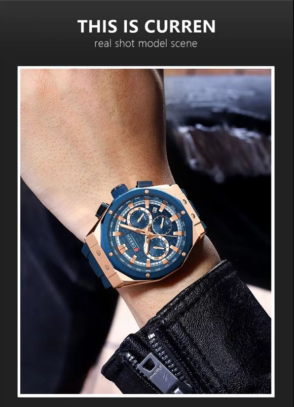 Blue and rose gold watch on a wrist with a blurred background