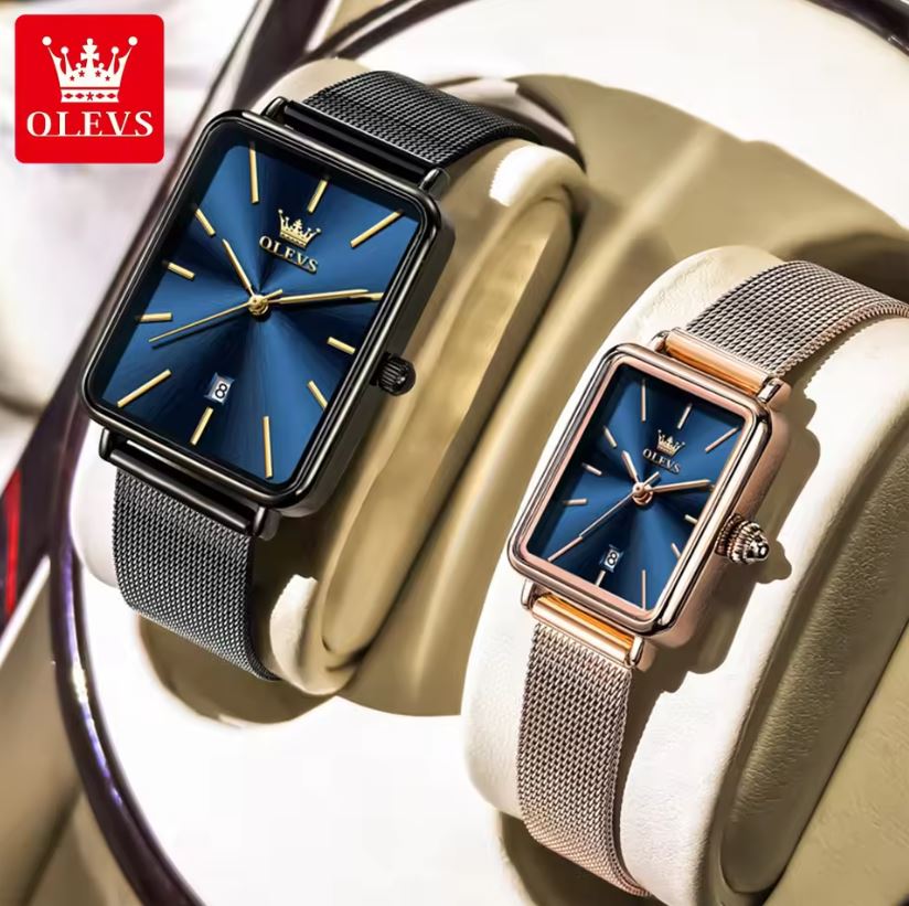 Two watches with blue faces and mesh straps on a decorative background, featuring the OLEVS brand.