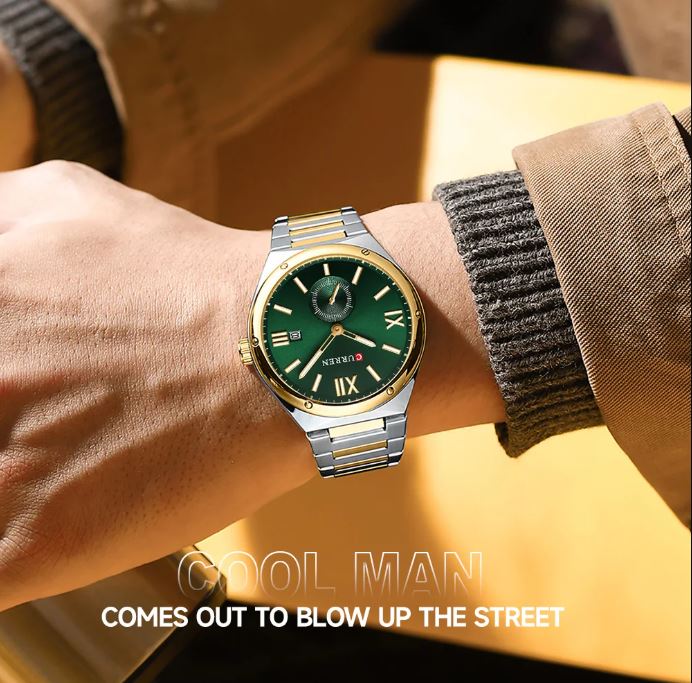 Green watch with gold accents on a wrist, text 'COOL MAN COMES OUT TO BLOW UP THE STREET' below.