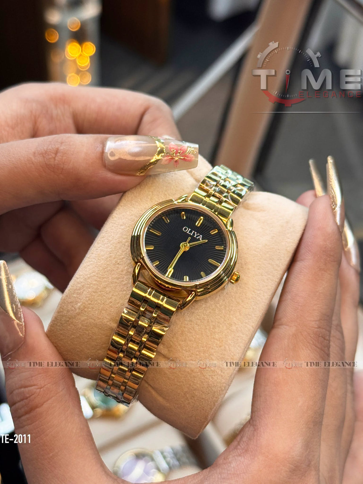 OLIYA 2011 Ladies Gold-Tone Watch – Champagne Sunburst Dial & Elegant Bracelet