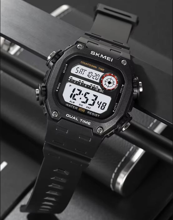 Black digital watch with multiple time zones on a dark background