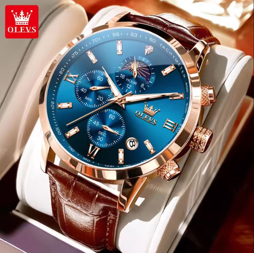 Luxury watch with blue dial and brown leather strap on a white stand, branded 'OLEVS'.