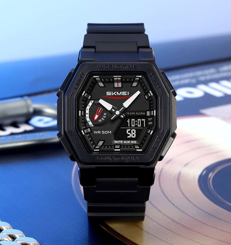 Black digital watch with a blue background