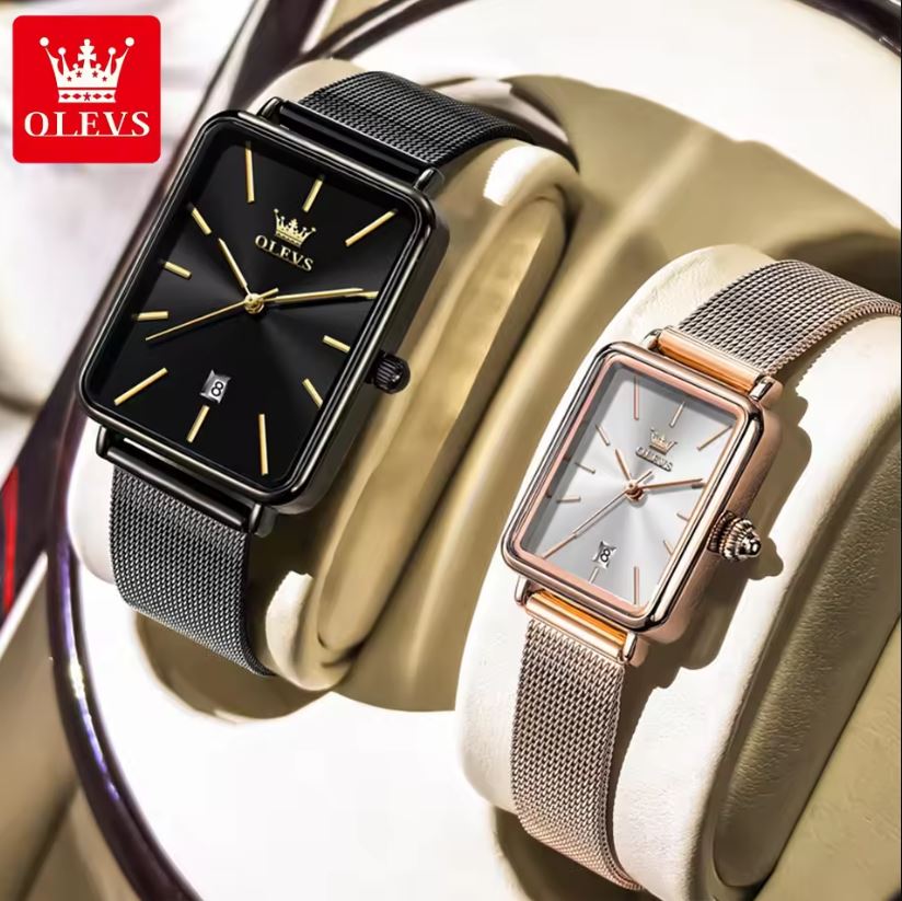 Two watches, one black and one rose gold, with OLEVS branding on a blurred background.