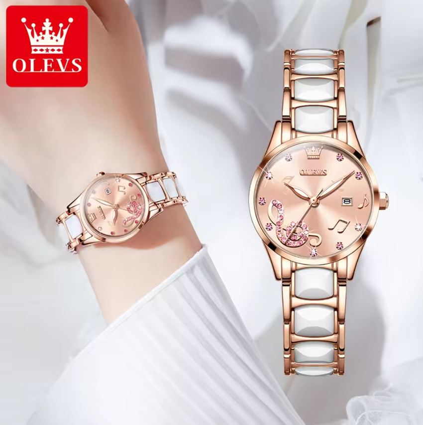 Rose gold and white watch on a wrist with OLEVS logo in the corner