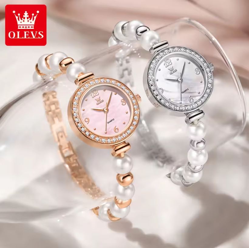 Two pearl-banded watches with different face designs on a soft background, featuring the OLEVS brand.