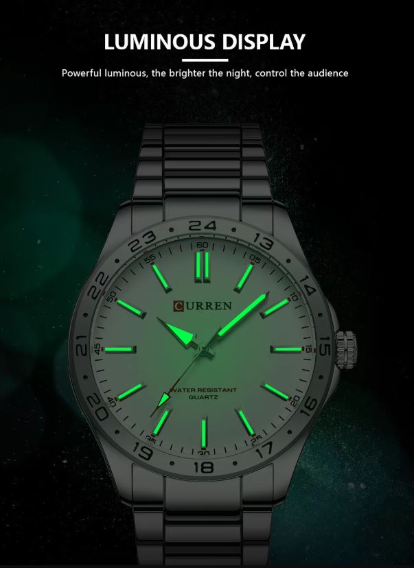 Curren watch with green luminous display on a dark background