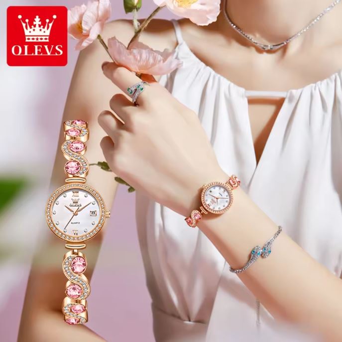 Woman wearing a decorative watch and bracelet with flowers, OLEVS brand visible