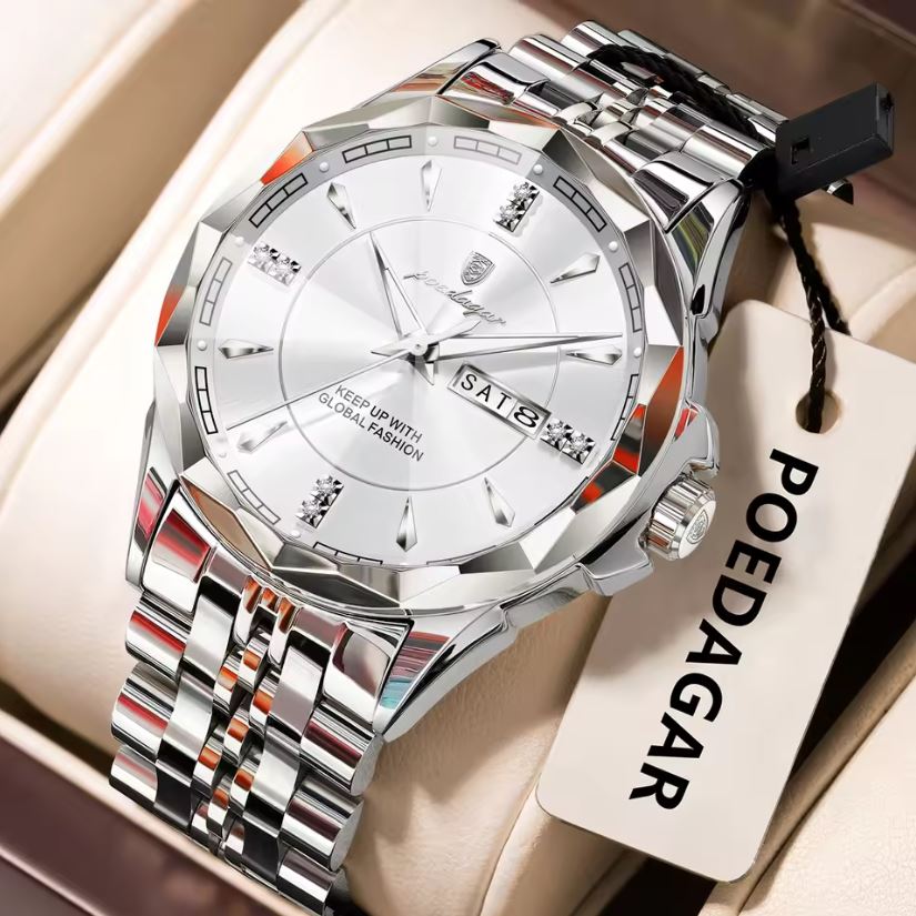 Silver wristwatch with a detailed face on a beige surface, featuring the brand 'POEDAGAR'.