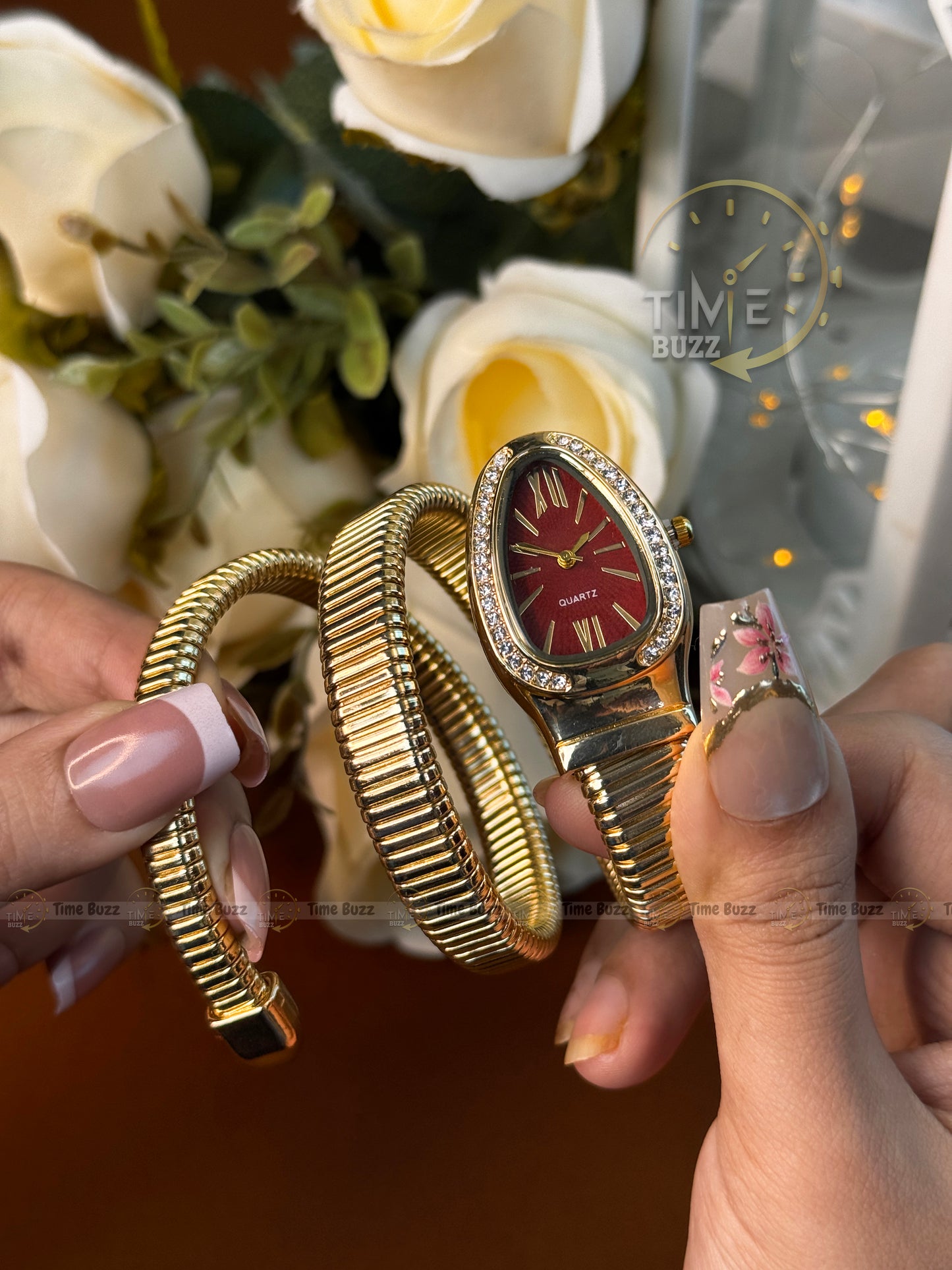 Luxury Gold Snake Bracelet Women's Quartz Watch with Burgundy Dial | Elegant Bangle Wristwatch