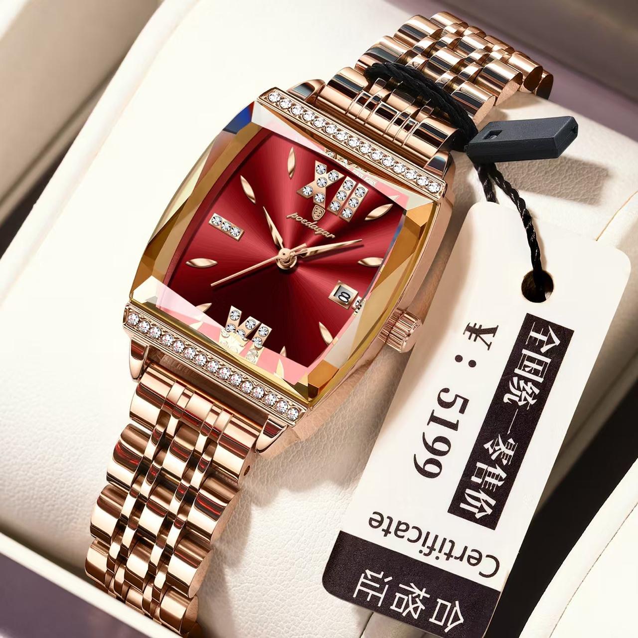 Luxury watch with rose gold strap and red face, displayed with a price tag.