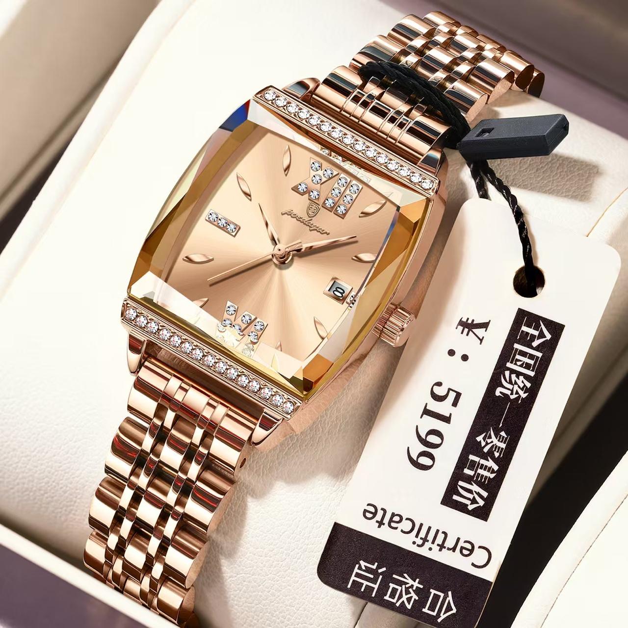 Rose gold watch with diamond accents on a white box, featuring a price tag.
