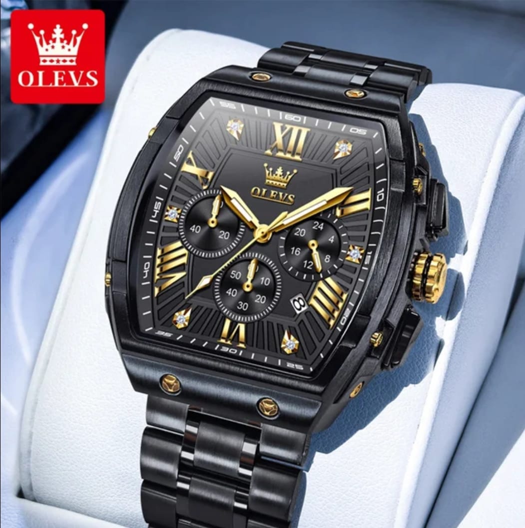 Black and gold watch with OLEVS branding on a light blue background