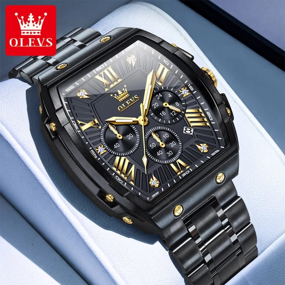Black and gold watch with OLEVS branding on a light blue background