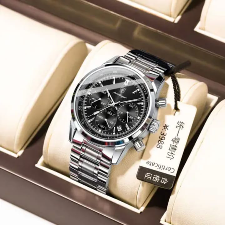 Silver wristwatch with black face in a display case