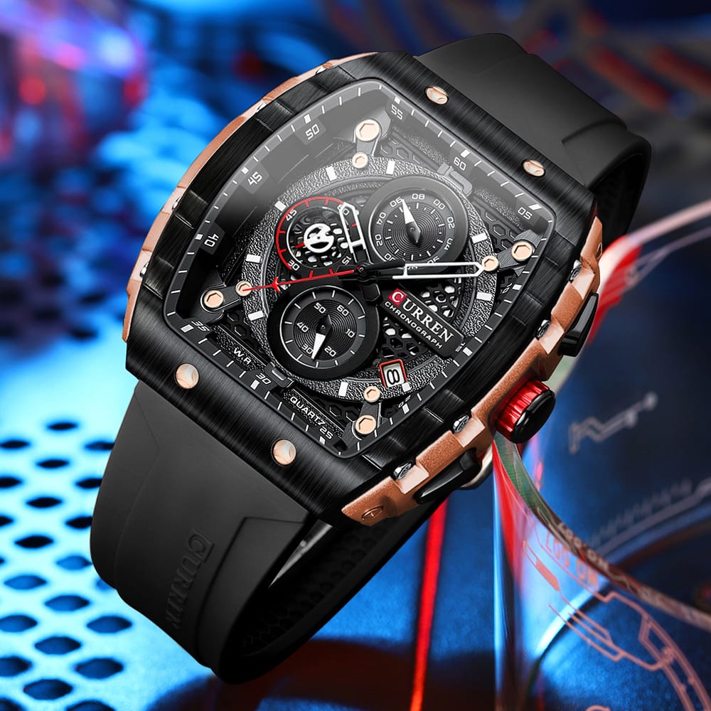 Luxury watch with black strap and detailed face on a colorful background