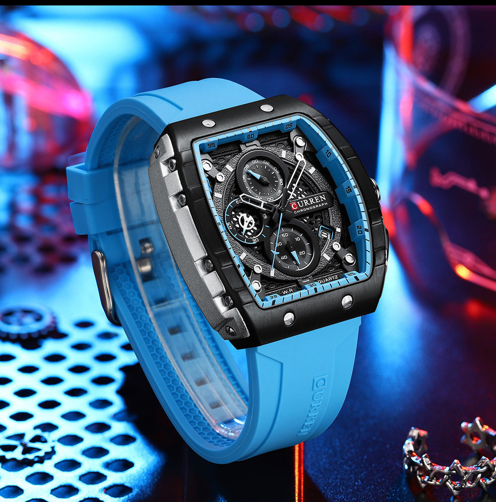 Luxury watch with blue strap on a colorful background