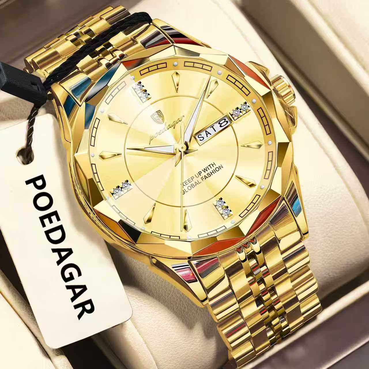 Gold wristwatch with a detailed face and colorful accents, displayed with a POEDAGAR tag.