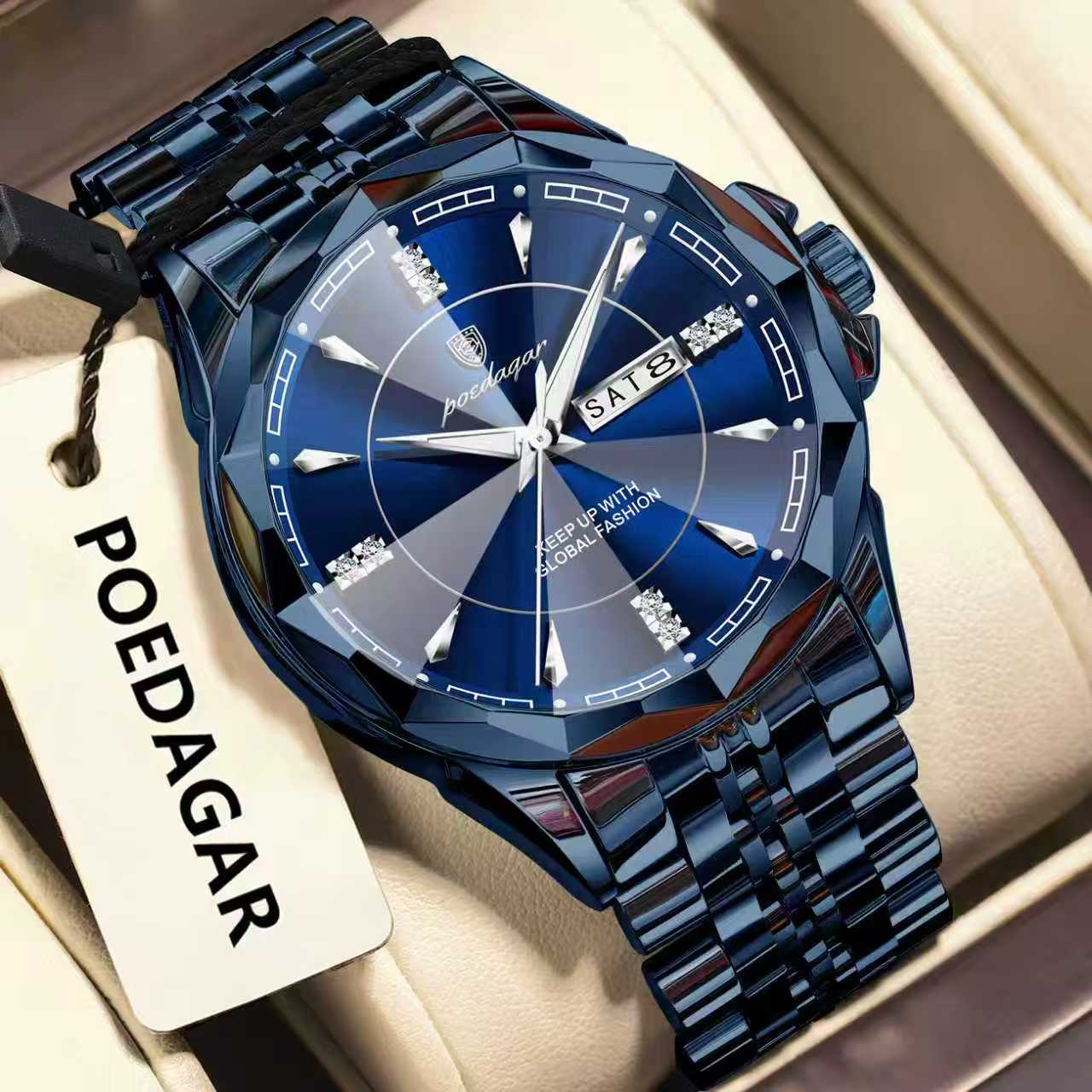 Blue wristwatch with diamond accents on a beige surface, featuring the brand 'POEDAGAR'.