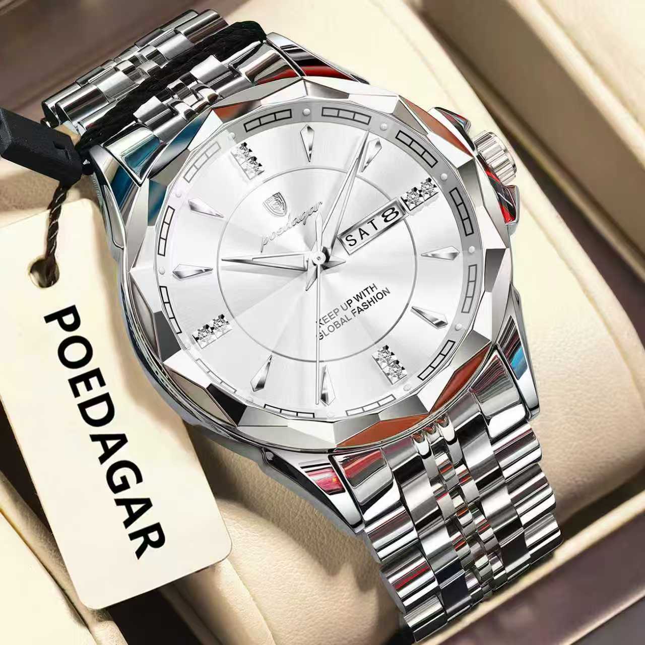Silver wristwatch with a detailed face on a beige background, featuring the brand 'POEDAGAR'.