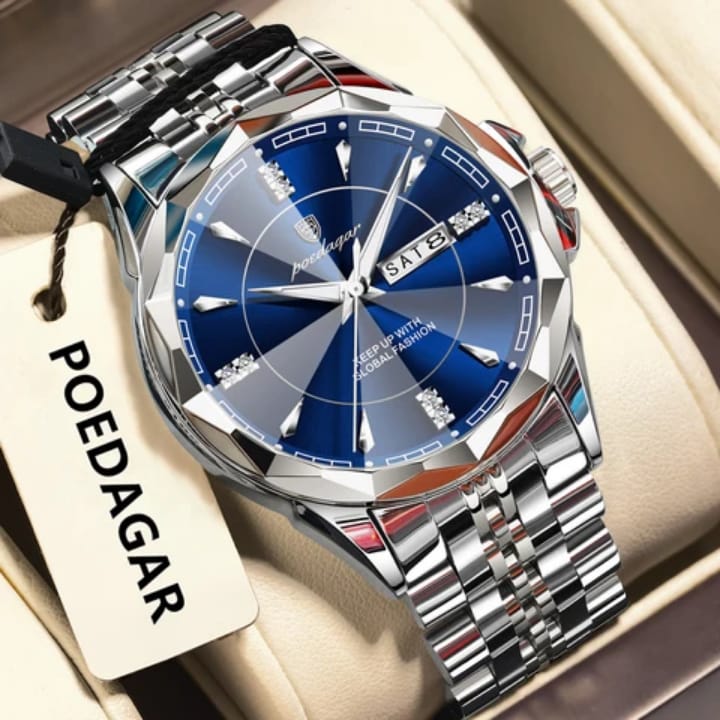 Silver watch with blue face and black strap on a beige surface, featuring the brand 'POEDAGAR'.