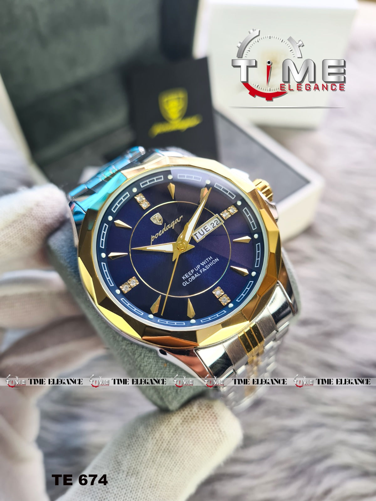 Luxury watch with blue face and gold accents on a textured surface, branded 'Time Elegance'.