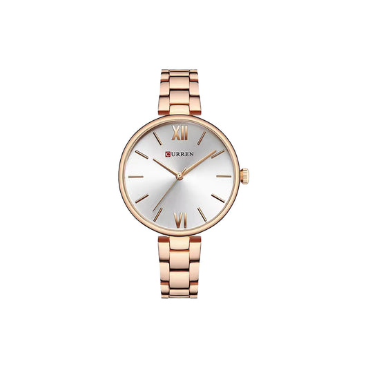 Rose gold watch with a white face on a white background