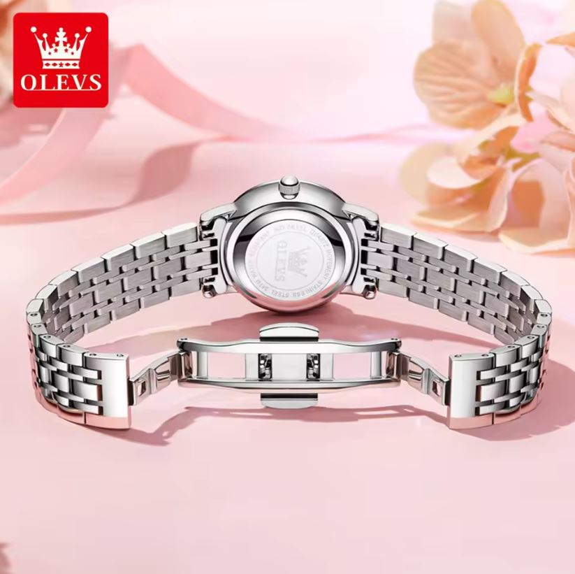 Silver watch with a floral background and OLEVS logo