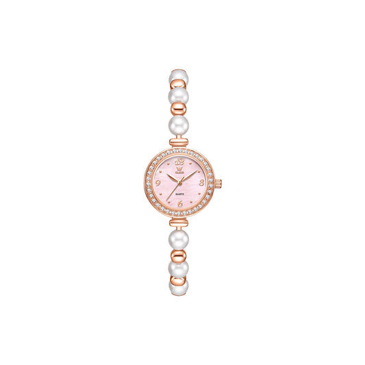 Wristwatch with pearl-like band on a white background