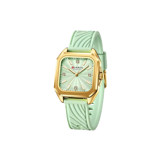 Mint green watch with gold accents on a white background
