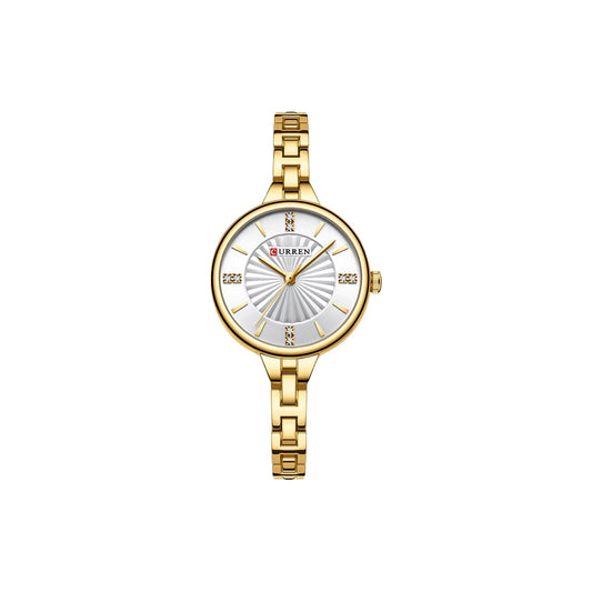 Gold wristwatch with a white face on a white background